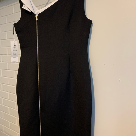 A Calvin Klein dress size 12 new, has zipper in the back. Very elegant - Picture 3 of 4